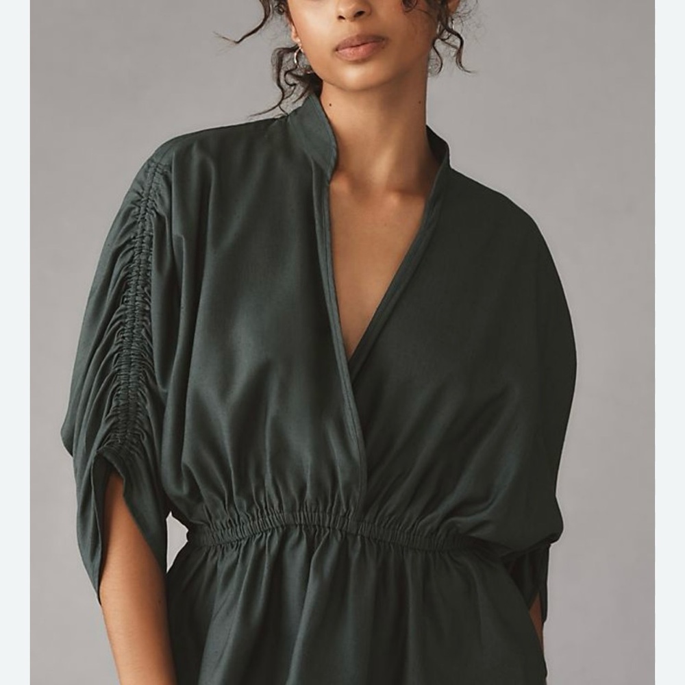 Anthropology Maeve. Size medium green/grey peplum blouse with shirred sleeve.